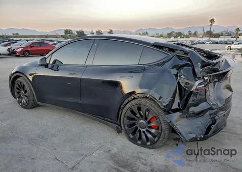 2022 Tesla Model Y from USA, damaged, VIN 7SAYGDEF2NF573559